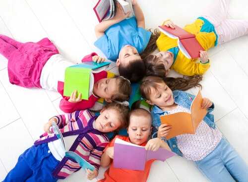 children-reading-1-min-59de24733f8bf42e890ebef2.jpg